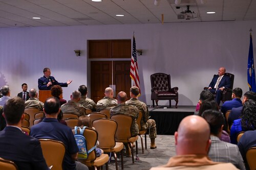 U.S. Air Force Col. Andrew Schad, Office of Special Investigations reserve advisor, gives remarks during the retirement ceremony of Special Agent Lynn Stedge, OSI Operating Location-B director, at Davis-Monthan Air Force Base, Arizona, Dec.19, 2024. The mission of OSI is to identify, exploit and neutralize criminal, intelligence and terrorist threats in multiple domains. (U.S. Air Force photo by Senior Airman Andrew Garavito)