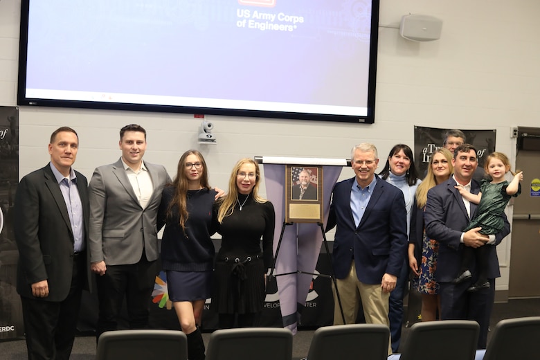 ERDC's Director Dr. David Pittman (second from right) and CRREL Director Dr. Ivan Beckman (left) with friends and family members of Dr. Mark Moran during his induction into the the CRREL Gallery of Distinguished Employees. (Photo by Joseph Bara)