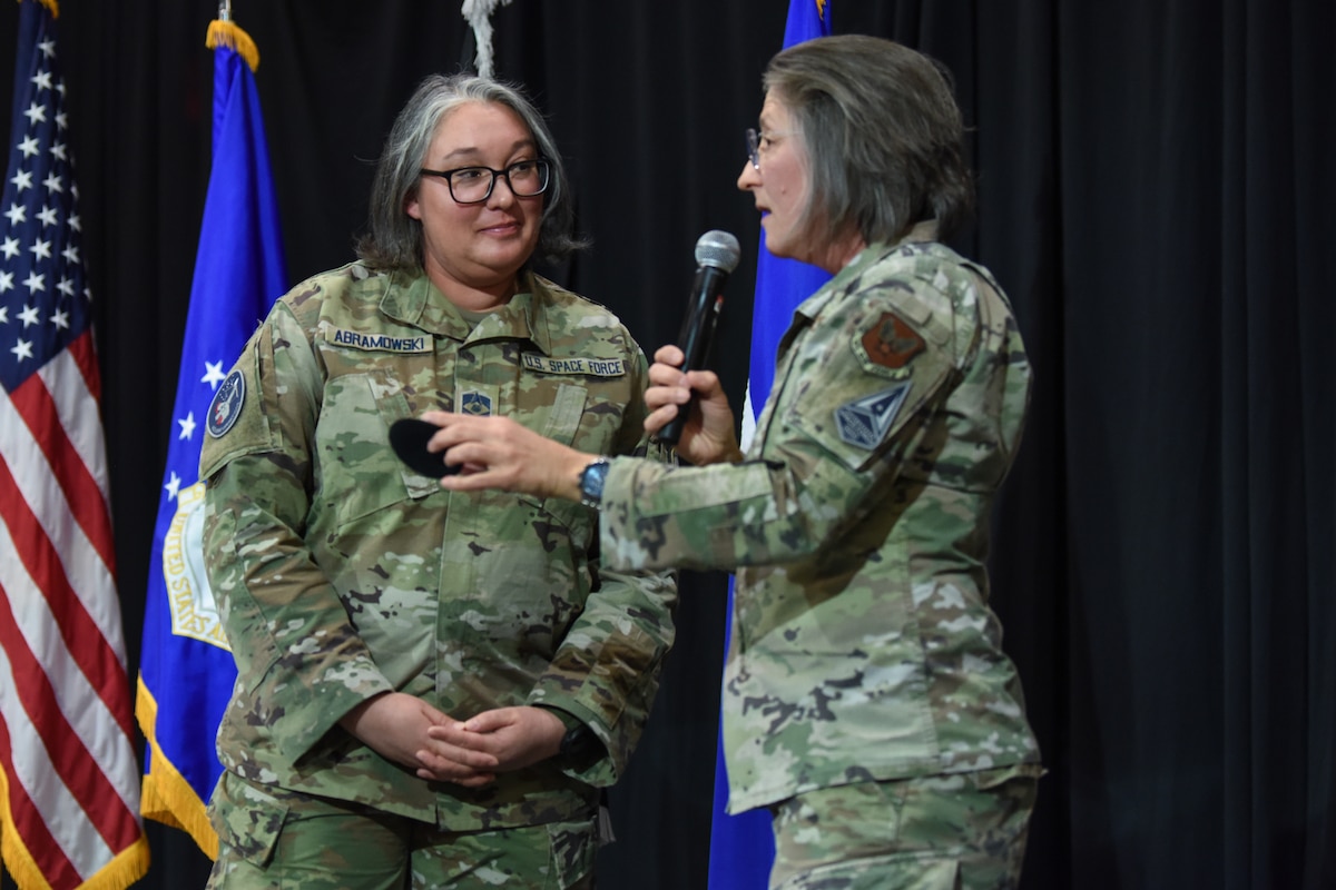 Image of two Airmen.