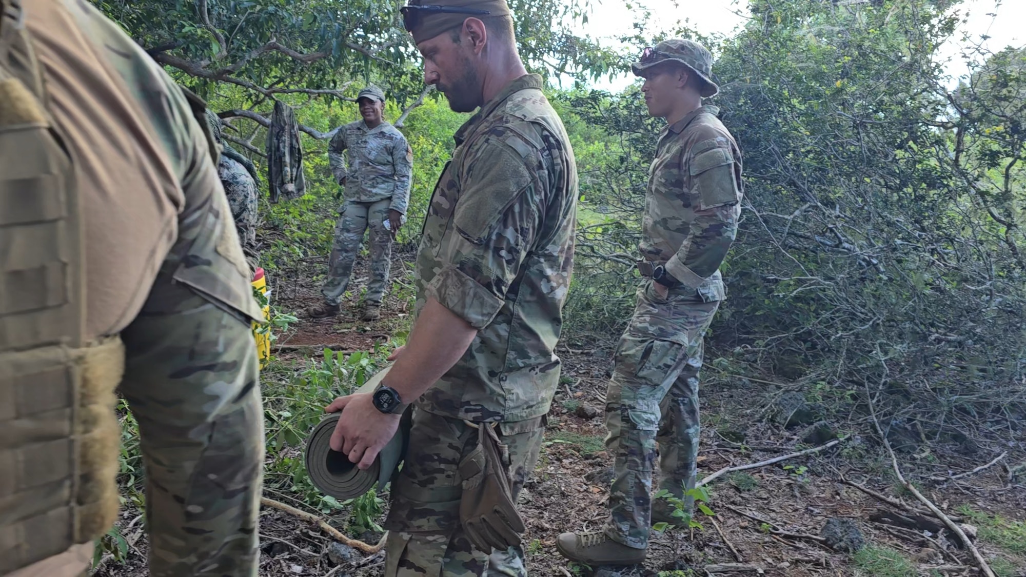 148th Fighter Wing Security Forces specialist, Master Sgt. Ian Nickila (center) and classmates participate in field training exercise on Oct. 16, 2024.