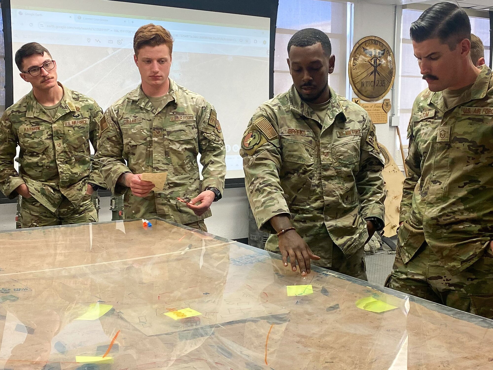 U.S. Air Force Master Sgt. Robert Tatum, far right, 42nd Medical Group pharmacy flight chief, is briefed by Airmen at Fort Bliss, Texas, Nov. 13, 2024.