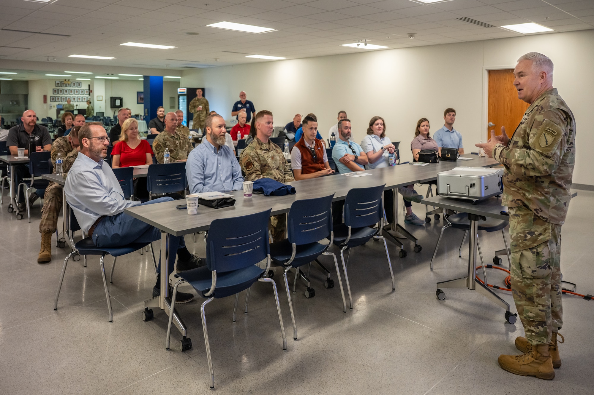 U.S. Army Maj. Gen. Haldane Lamberton, adjutant general of the Kentucky National Guard, speaks to a group of civilian employers at the Kentucky Air National Guard Base in Louisville, Ky., Sept. 19, 2024, as part of an Employer Support of the Guard and Reserve Bosslift. The event, which included an orientation flight aboard a Kentucky Air Guard C-130J Super Hercules aircraft, promotes enhanced understanding of the Guard mission among the civilian community. (U.S. Air National Guard photo by Dale Greer)
