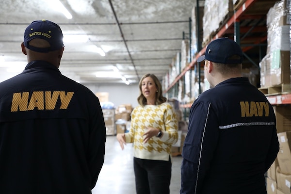 KANSAS CITY, Mo. (Nov. 15, 2024) Kristin Robinson, executive director of Project C.U.R.E. in Kansas City, gives a tour of a medical facility distribution center to volunteers from Navy Medicine during Navy Week Kansas City. Since 2005, America’s Navy has come home to up to 15 cities across the country every year. The Navy Week program has served as the Navy’s principal outreach effort into areas of the nation without a significant Navy presence, with over 300 Navy Weeks held in 95 different U.S. cities. Navy Medicine, represented by more than 44,000 highly-trained military and civilian health care professionals, provides enduring expeditionary medical support to the warfighter on, below, and above the sea and ashore. (U.S. Navy photo by Hospital Corpsman 2nd Class Alejandra Ramirez Alarcon/Released)