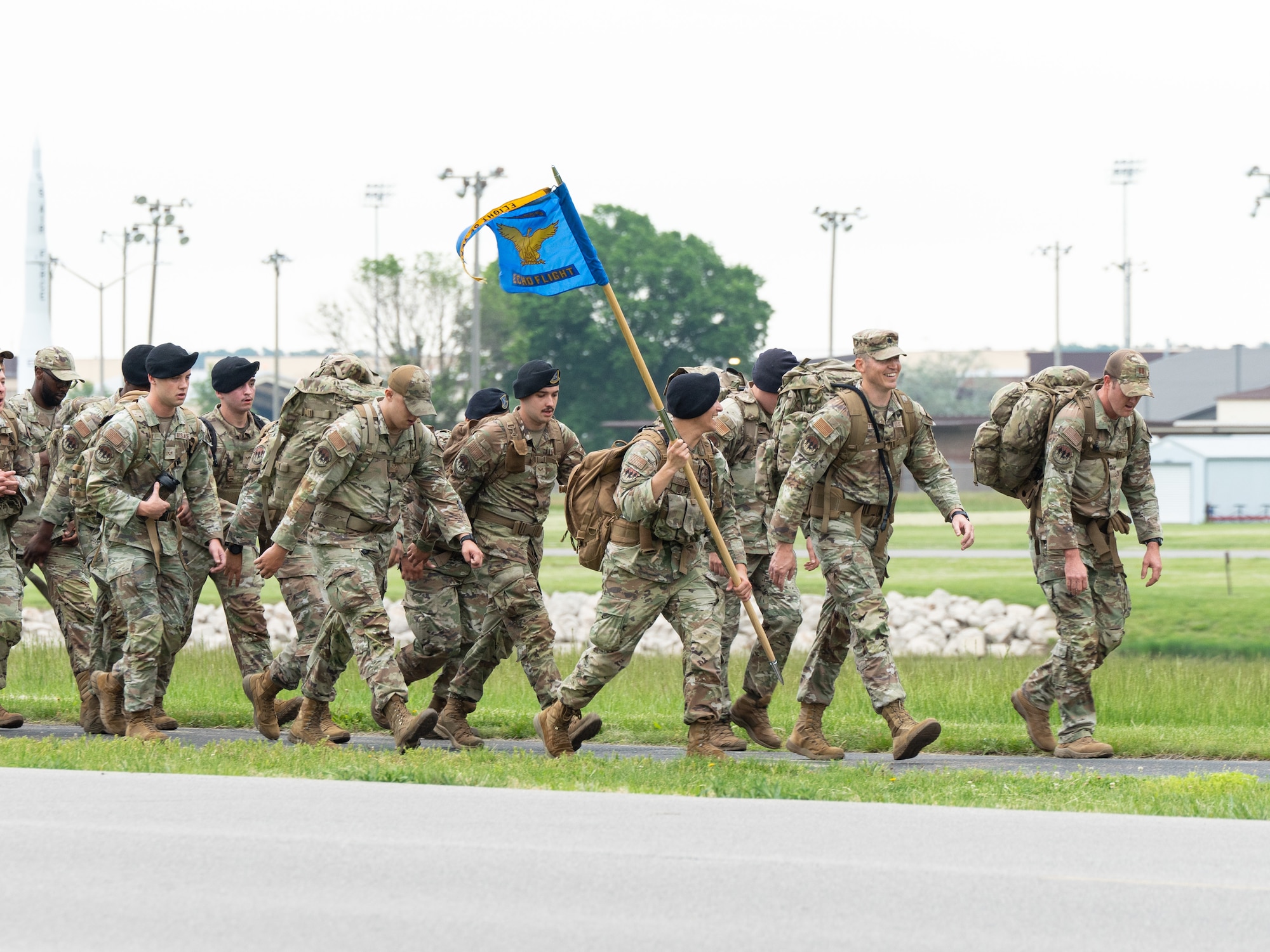 U.S. Airmen assigned to the 509th Security Forces Squadron ruck for Police Week at Whiteman Air Force Base, Mo., May 13, 2024. Security forces across the Air Force honor, remember and pay homage to those members who lost their lives in the line of duty during National Police Week. (U.S. Air Force photo by Airman 1st Class Robert E. Hicks)