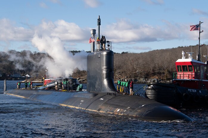 The pre-commissioning unit (PCU) Iowa (SSN 797) arrives for the first time at Naval Submarine Base New London in Groton, Connecticut, December 19, 2024. The future USS Iowa was delivered to Submarine Squadron (SUBRON) 4 from General Dynamics Electric Boat shipbuilding facility down river after recently completing a series of at-sea testing.