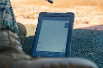 A tablet from a Mantis BlackbeardX Dry Fire Laser Training System displays data following a course of fire during a grass week training event at Marine Corps Base Camp Pendleton, California, Dec. 18, 2024. Recruits use the Mantis technology which provides feedback on how much an individual moved during the trigger pull and will provide feedback on how to improve shooting mechanics. The Marine Corps implemented the Mantis system to further assist recruits in developing their warfighting skills. (U.S. Marine Corps photo by Cpl. Francisco Angel)