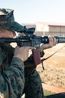 U.S. Marine Corps Recruit Magnus Ricketts, sights in with his rifle during a grass week training event at Marine Corps Base Camp Pendleton, California, Dec 18, 2024. Recruits use the Mantis technology which provides feedback on how much an individual moved during the trigger pull and will provide feedback on how to improve shooting mechanics. The Marine Corps implemented the Mantis system to further assist recruits in developing their warfighting skills. (U.S. Marine Corps photo by Cpl. Francisco Angel)