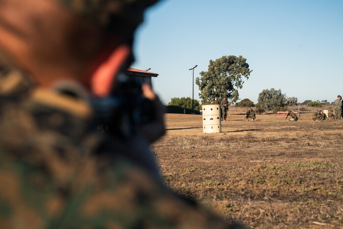 A U.S. Marine Corps with Bravo Company, 1st Recruit Training Battalion, sights in with his rifle during a grass week training event at Marine Corps Base Camp Pendleton, California, Dec 18, 2024. Recruits use the Mantis technology which provides feedback on how much an individual moved during the trigger pull and will provide feedback on how to improve shooting mechanics. The Marine Corps implemented the Mantis system to further assist recruits in developing their warfighting skills. (U.S. Marine Corps photo by Cpl. Francisco Angel)