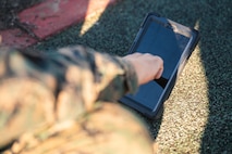 U.S. Marine Corps Recruit Magnus Ricketts, sights in with his rifle during a grass week training event at Marine Corps Base Camp Pendleton, California, Dec 18, 2024. Recruits use the Mantis technology which provides feedback on how to improve shooting mechanics. The Marine Corps implemented the Mantis system to further assist recruits in developing their warfighting skills. (U.S. Marine Corps photo by Cpl. Francisco Angel)