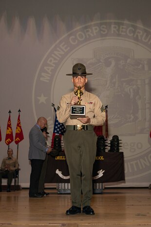 New U.S. Marine Corps Drill Instructor, Sgt. Juan Delharo, honor graduate of his class, poses for a photo during the Marine Corps Recruit Depot San Diego DI School 1-25 graduation ceremony at Marine Corps Recruit Depot San Diego, California, Dec. 18, 2024. During DI school, Marines developed leadership skills, mastered drill, met physical fitness requirements and learned how to make Marines. Our Marines continue to serve their nation and their Corps through their lived examples of our values and by helping to identify and select potential recruits who may have what it takes to earn the title. (U.S. Marine Corps photo by Lance Cpl. Janell B. Alvarez)