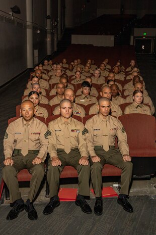 U.S. Marines with Marine Corps Recruit Depot San Diego Drill Instructor School class 1-25, await the start of their graduation ceremony at MCRD San Diego, California, Dec. 18, 2024. During DI school, Marines developed leadership skills, mastered drill, met physical fitness requirements and learned how to make Marines. Our Marines continue to serve their nation and their Corps through their lived examples of our values and by helping to identify and select potential recruits who may have what it takes to earn the title. (U.S. Marine Corps photo by Lance Cpl. Janell B. Alvarez)