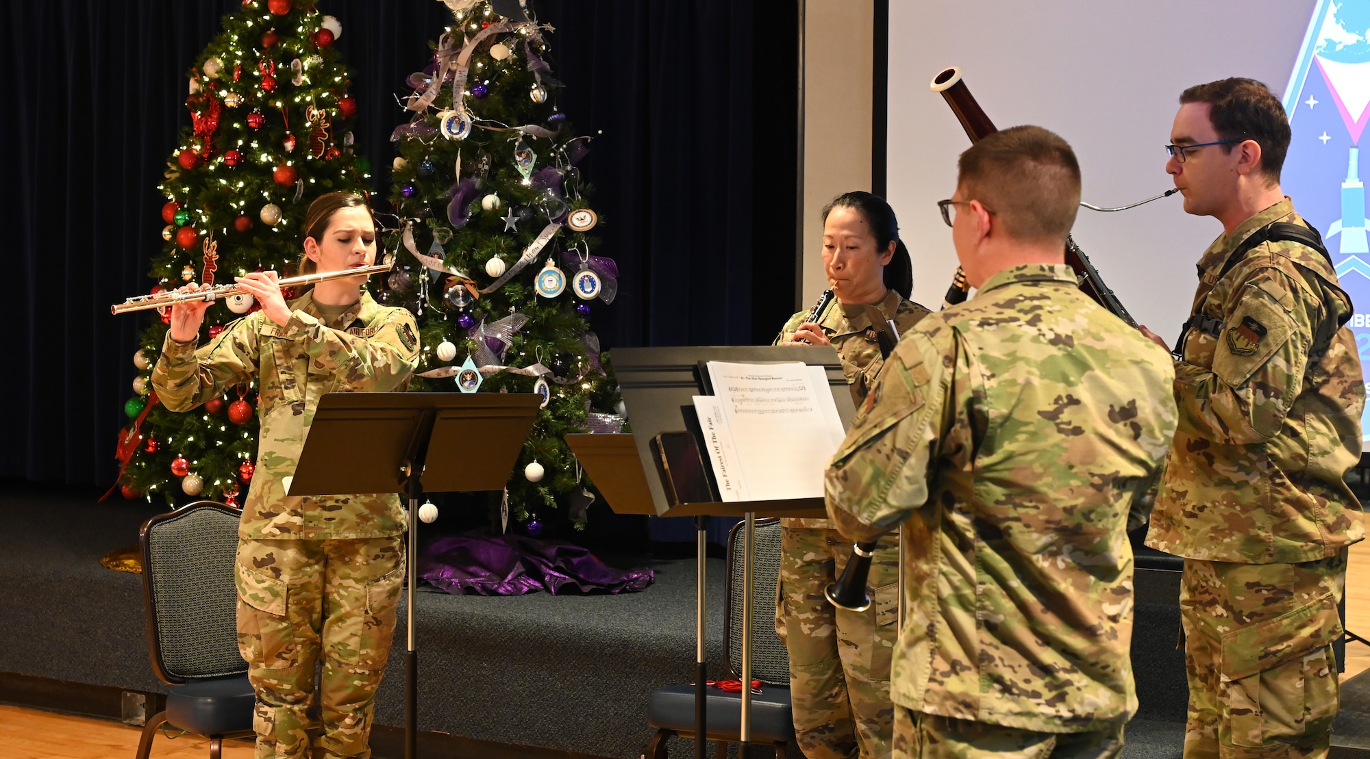 Members of the U.S. Air Force Academy Band plays the national anthem during a USSF 5th Anniversary celebration.