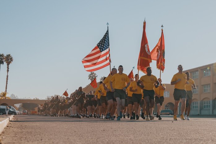 U.S. Marines with Recruit Training Regiment, lead the company motivational run for Fox Company, 2nd Recruit Training Battalion, at Marine Corps Recruit Depot San Diego, California, Dec. 19, 2024. The company motivational run is a three-mile cadence run conducted around the Depot and is the last physical training event the Marines will conduct before they graduate from MCRD San Diego. The event is also the first time friends and families will see their newly transformed Marines. The same fighting spirit that led Marines in the fight at Chapultepec, Belleau Wood, Iwo Jima, Okinawa, the Chosin Reservoir, Vietnam, in Fallujah and Marjah thrives in our Marines today. (U.S. Marine Corps photo by Lance Cpl. Janell B. Alvarez)