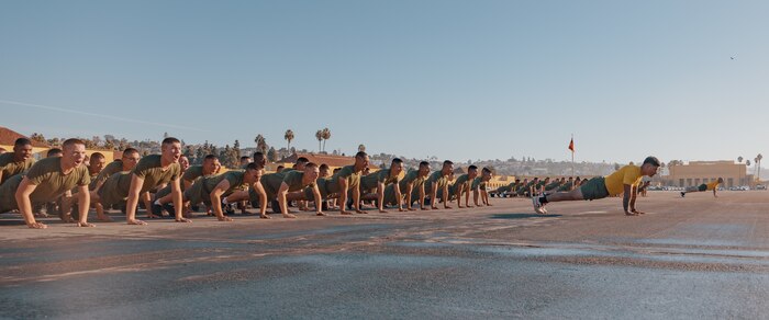 New U.S. Marines with Fox Company, 2nd Recruit Training Battalion, execute dynamic warm-ups prior to the company motivational run at Marine Corps Recruit Depot San Diego, California, Dec. 19, 2024. The company motivational run is a three-mile cadence run conducted around the Depot and is the last physical training event the Marines will conduct before they graduate from MCRD San Diego. The event is also the first time friends and families will see their newly transformed Marines. The same fighting spirit that led Marines in the fight at Chapultepec, Belleau Wood, Iwo Jima, Okinawa, the Chosin Reservoir, Vietnam, in Fallujah and Marjah thrives in our Marines today. (U.S. Marine Corps photo by Lance Cpl. Janell B. Alvarez)