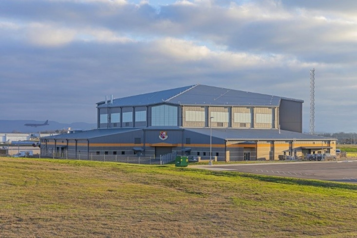 two story building with lots of glass paneling on the second level