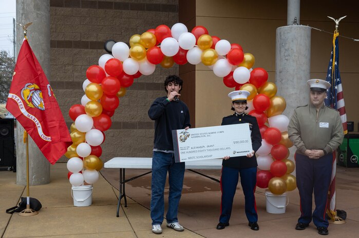 Alexander Grant, recipient of the Naval Reserve Officers Training Corps scholarship, addresses his classmates about his selection into the NROTC program during a scholarship presentation in Folsom, California, Dec. 17, 2024. Grant was awarded a $180,000 scholarship into the NROTC program.  The intent of the NROTC Scholarship Program is to educate and train highly qualified young men and women for careers as commissioned officers in the Marine Corps and Naval service. (U.S. Marine Corps photo by Staff Sgt. Ryan Harvey)