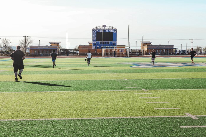 Beaumont High School students participate in a modified combat fitness test during during a weight room takeover at Beaumont High School in Beaumont, California, Dec. 16, 2024. A weight room takeover is an event where Marines engage with students in a gym setting, leading workouts and demonstrating fitness techniques as part of a community outreach or recruitment effort. (U.S. Marine Corps photo by Cpl. Alejandro Fernandez)