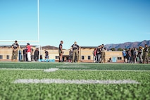 U.S. Marines with Recruiting Sub-Station Hemet, Recruiting Station San Diego, train students during a weight room takeover at Beaumont High School in Beaumont, California, Dec. 16, 2024. A weight room takeover is an event where Marines engage with students in a gym setting, leading workouts and demonstrating fitness techniques as part of a community outreach or recruitment effort. (U.S. Marine Corps photo by Cpl. Alejandro Fernandez)