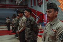 U.S. Marine Corps Staff Sgt. Angel Flores, station commander with Recruiting Sub-Station National City, Recruiting Station San Diego, attends a Junior Reserve Officer Training Corps drill competition at Sweetwater High School in National City, California, Dec. 7, 2024. The Junior Reserve Officer Training Corps drill competition is a formal event where cadets perform synchronized marching routines and precision drill to demonstrate discipline, teamwork and leadership skills. (U.S. Marine Corps photo by Cpl. Alejandro Fernandez)