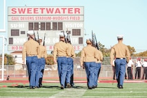 Junior Reserve Officer Training Corps cadets participate in a Junior Reserve Officer Training Corps drill competition at Sweetwater High School in National City, California, Dec. 7, 2024. The Junior Reserve Officer Training Corps drill competition is a formal event where cadets perform synchronized marching routines and precision drill to demonstrate discipline, teamwork and leadership skills. (U.S. Marine Corps photo by Cpl. Alejandro Fernandez)