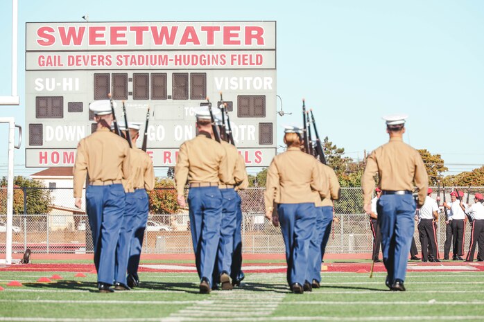 Junior Reserve Officer Training Corps cadets participate in a Junior Reserve Officer Training Corps drill competition at Sweetwater High School in National City, California, Dec. 7, 2024. The Junior Reserve Officer Training Corps drill competition is a formal event where cadets perform synchronized marching routines and precision drill to demonstrate discipline, teamwork and leadership skills. (U.S. Marine Corps photo by Cpl. Alejandro Fernandez)