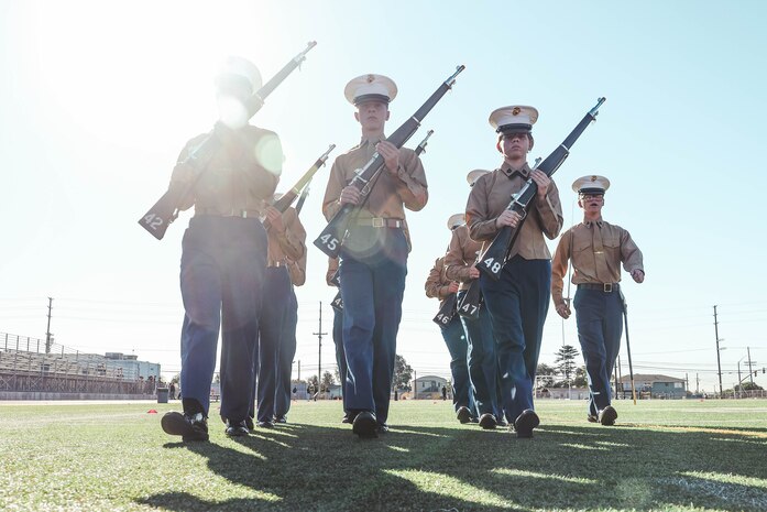 Junior Reserve Officer Training Corps cadets participate in a Junior Reserve Officer Training Corps drill competition at Sweetwater High School in National City, California, Dec. 7, 2024. The Junior Reserve Officer Training Corps drill competition is a formal event where cadets perform synchronized marching routines and precision drill to demonstrate discipline, teamwork and leadership skills. (U.S. Marine Corps photo by Cpl. Alejandro Fernandez)