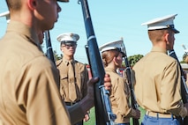 Junior Reserve Officer Training Corps cadets participate in a Junior Reserve Officer Training Corps drill competition at Sweetwater High School in National City, California, Dec. 7, 2024. The Junior Reserve Officer Training Corps drill competition is a formal event where cadets perform synchronized marching routines and precision drill to demonstrate discipline, teamwork and leadership skills. (U.S. Marine Corps photo by Cpl. Alejandro Fernandez)