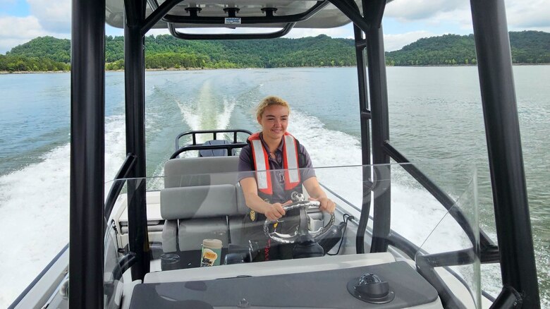 Park Ranger Remi Clarke patrols Center Hill Lake June 24, 2024, in Tennessee. The U.S. Army Corps of Engineers Nashville District has named her employee of the month for October 2024 for exceptional leadership in managing the fiscal year 2024 Campground, Day Use, and Water Safety Programs supporting recreation, and for her dedication to the Pollinators Program and emphasizing conservation. (USACE Photo by Terry Martin)