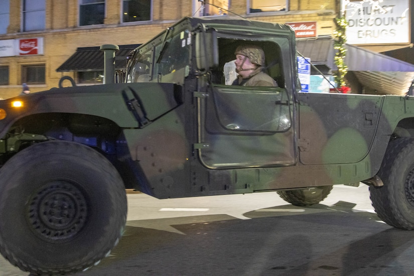 Kentucky National Guard Soldiers with Charlie Battery, 2nd Battalion, 138th Field Artillery Brigade took part in the 2024 Bardstown Christmas Parade, Dec. 5, 2024. (U.S. Army National Guard photo by Milt Spalding)