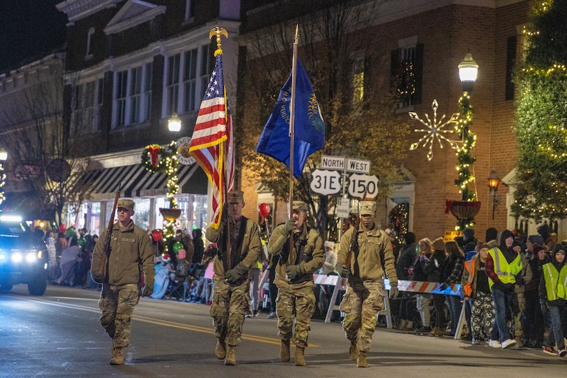 Kentucky National Guard Soldiers with Charlie Battery, 2nd Battalion, 138th Field Artillery Brigade took part in the 2024 Bardstown Christmas Parade, Dec. 5, 2024. (U.S. Army National Guard photo by Milt Spalding)