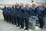The inaugural class of the U.S. Air Force’s Warrant Officer Training School take the oath of office at Maxwell Air Force Base, Ala., Dec. 6, 2024.
