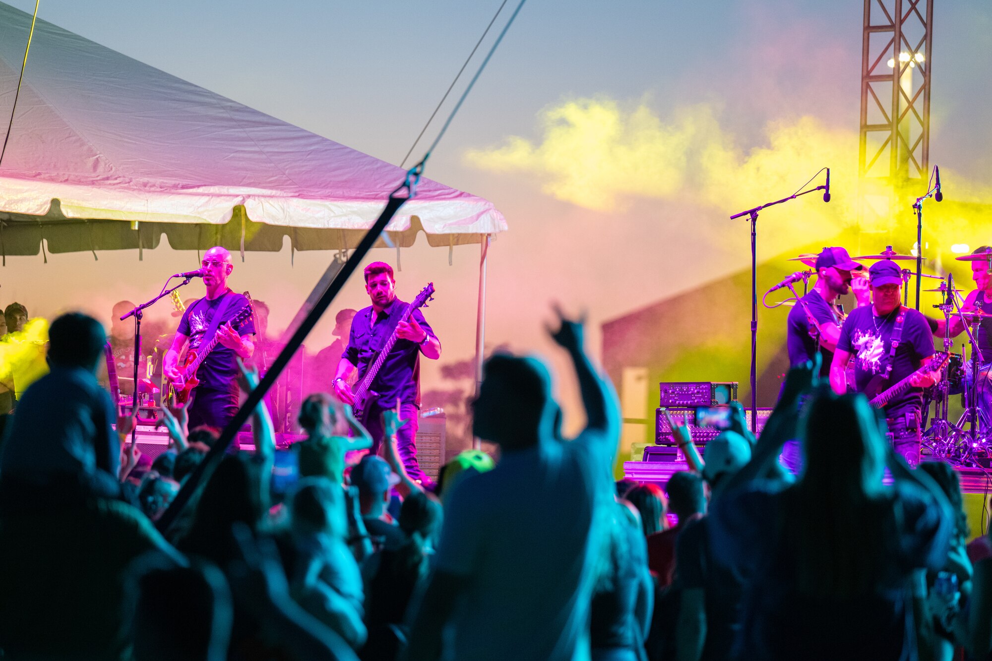 The band Fuel performs on stage as part of the Spring Rock-Fest Concert Tour at Whiteman Air Force Base, Mo., May 11, 2024. This concert was put on by Air Force Live Stage Entertainment as an effort to increase morale for Team Whiteman. (U.S. Air Force photo by Airman 1st Class Matthew Domingos)