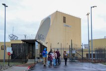 Families leave the 7th Space Warning Squadron (7 SWS) after tracking and talking to Santa Claus during the 7 SWS's Santa Tracker event at Beale Air Force Base, California, Dec. 24, 2024.