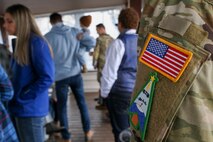 U.S. Space Force Specialist Raiden Chambers, 7th Space Warning Squadron (7 SWS), wears a holiday variant of a 7 SWS patch during their annual Santa Tracker event at Beale Air Force Base, California, Dec. 24, 2024.