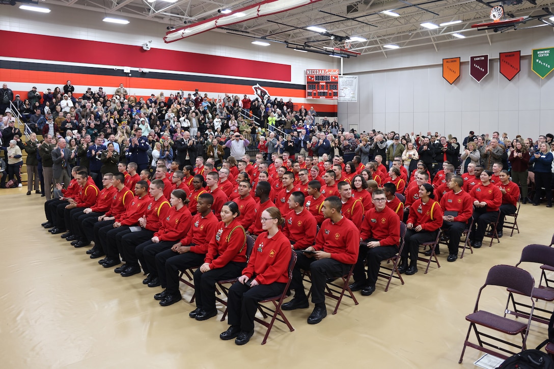 86 cadets of the Wisconsin National Guard Challenge Academy's class 53 are applauded by friends, family and attending dignitaries during their graduation ceremony December 21, 2024, at Necedah High School in Necedah, Wisconsin.