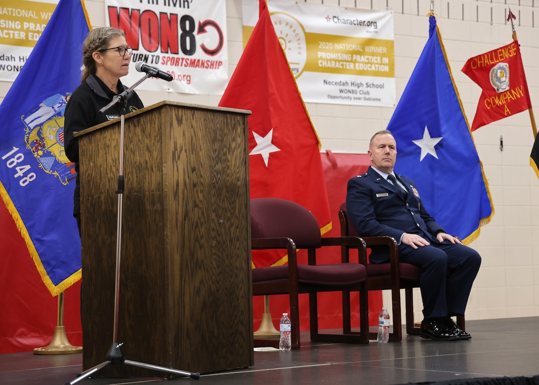 Retired U.S. Army Brig. Gen. Joni Matthews, director of the Wisconsin National Guard Challenge Academy, addresses cadets and family members at the graduation ceremony of class 53 December 21, 2024, at Necedah High School in Necedah, Wisconsin.