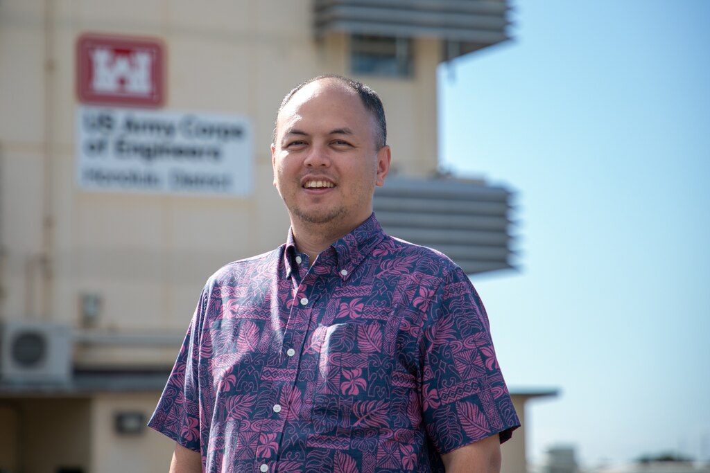 Dr. David Nguyen in front of the Honolulu District U.S. Army Corps of Engineers building December 16, 2024.