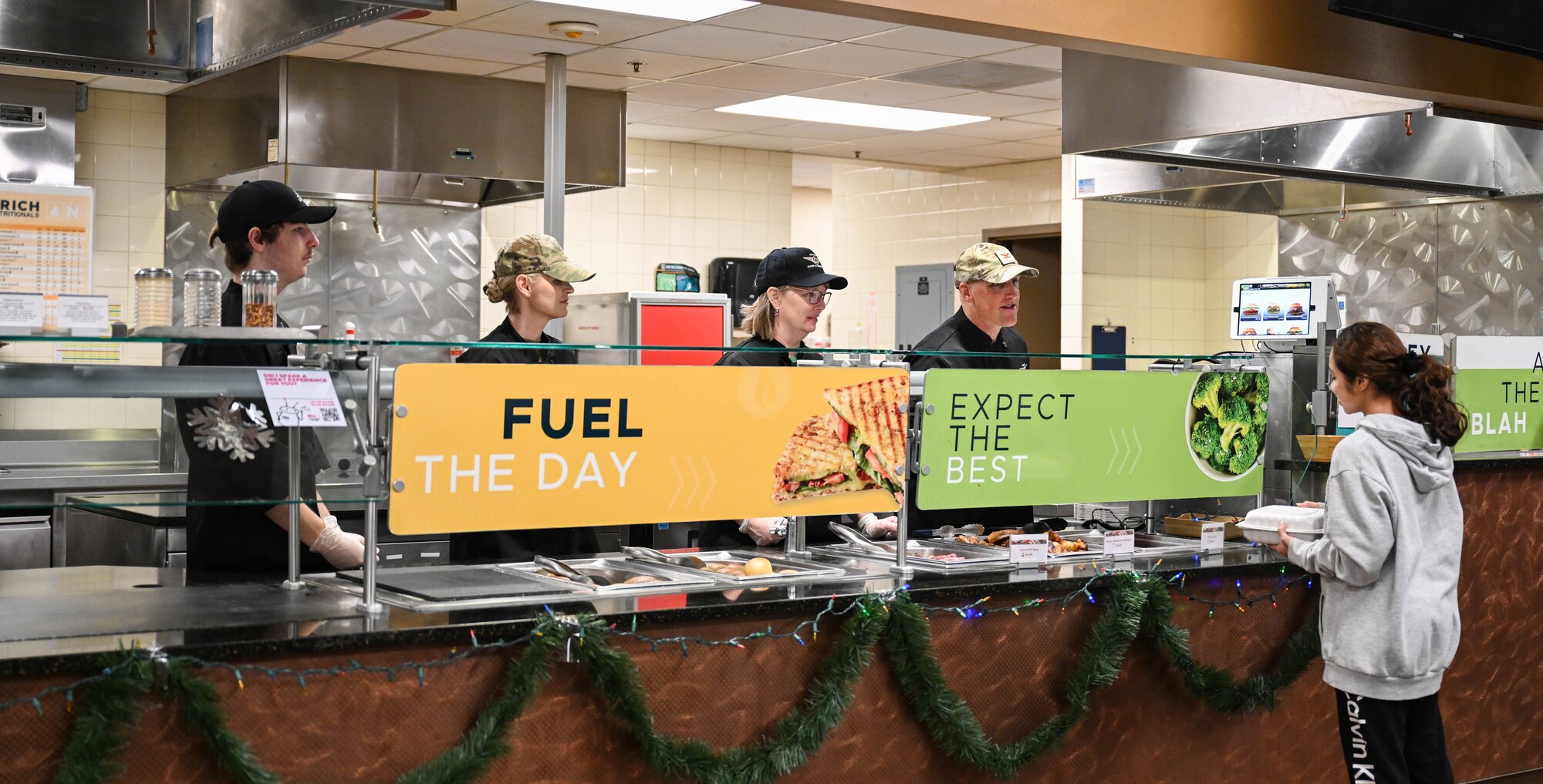 28th Bomb Wing Leadership serve food to Airmen
