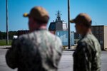 REDZIKOWO, Poland – Rear Adm. Brad Collins, Commander, Navy Region Europe, Africa, Central inspects installation facilities with Capt. Ronel Reyes, Commander, Naval Support Facility (NSF) Redzikowo, Aug. 7, 2024.