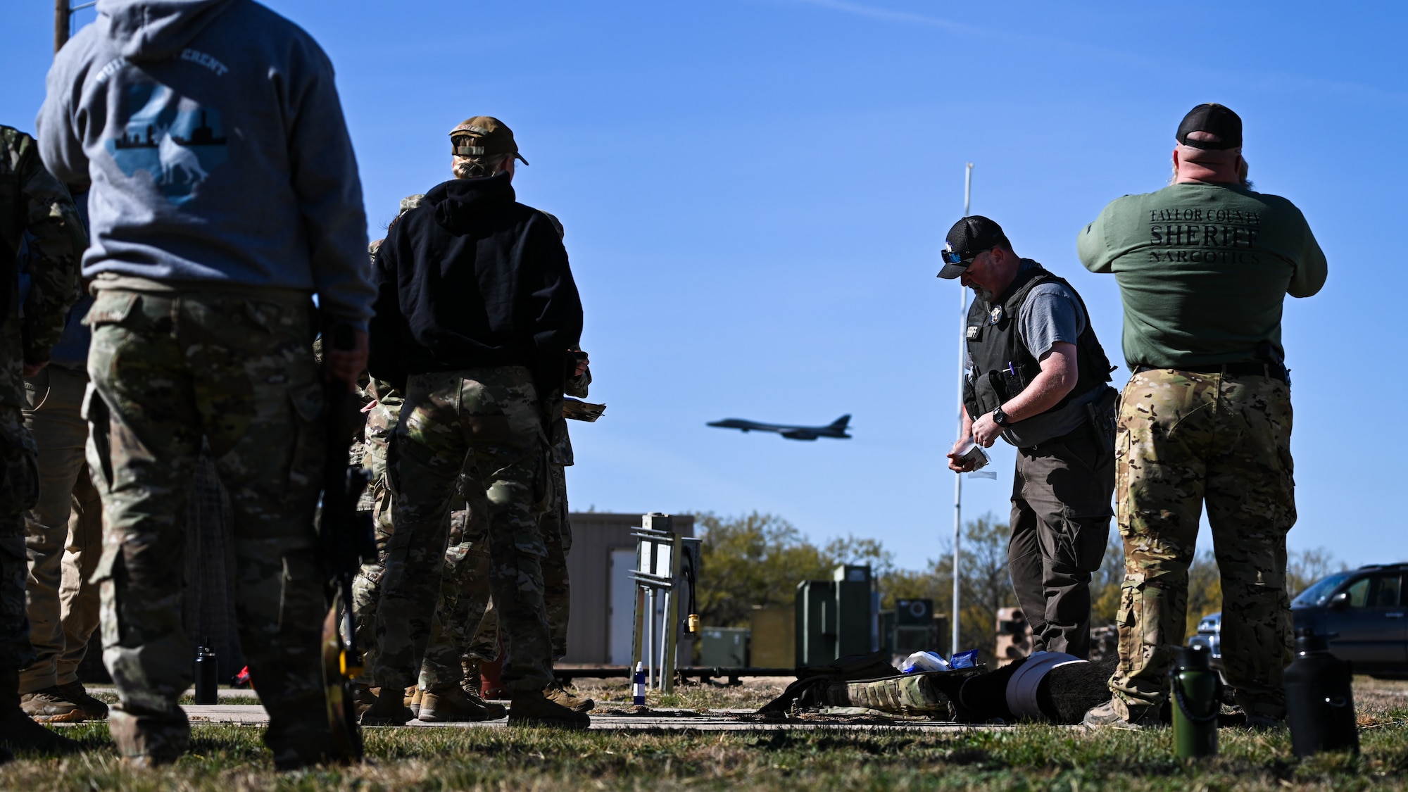 Law enforcement from Taylor County Sheriff's Department participate in a tactical combat casualty care exercise during a U.S. Army led K-9 medical training at Dyess Air Force Base, Texas, Dec. 19, 2024. The training event connected civilian and military law enforcement personnel with medical professionals who were able to share their experiences and give guidance when caring for injured K-9s. (U.S. Air Force photo by Airman 1st Class Jade M. Caldwell)