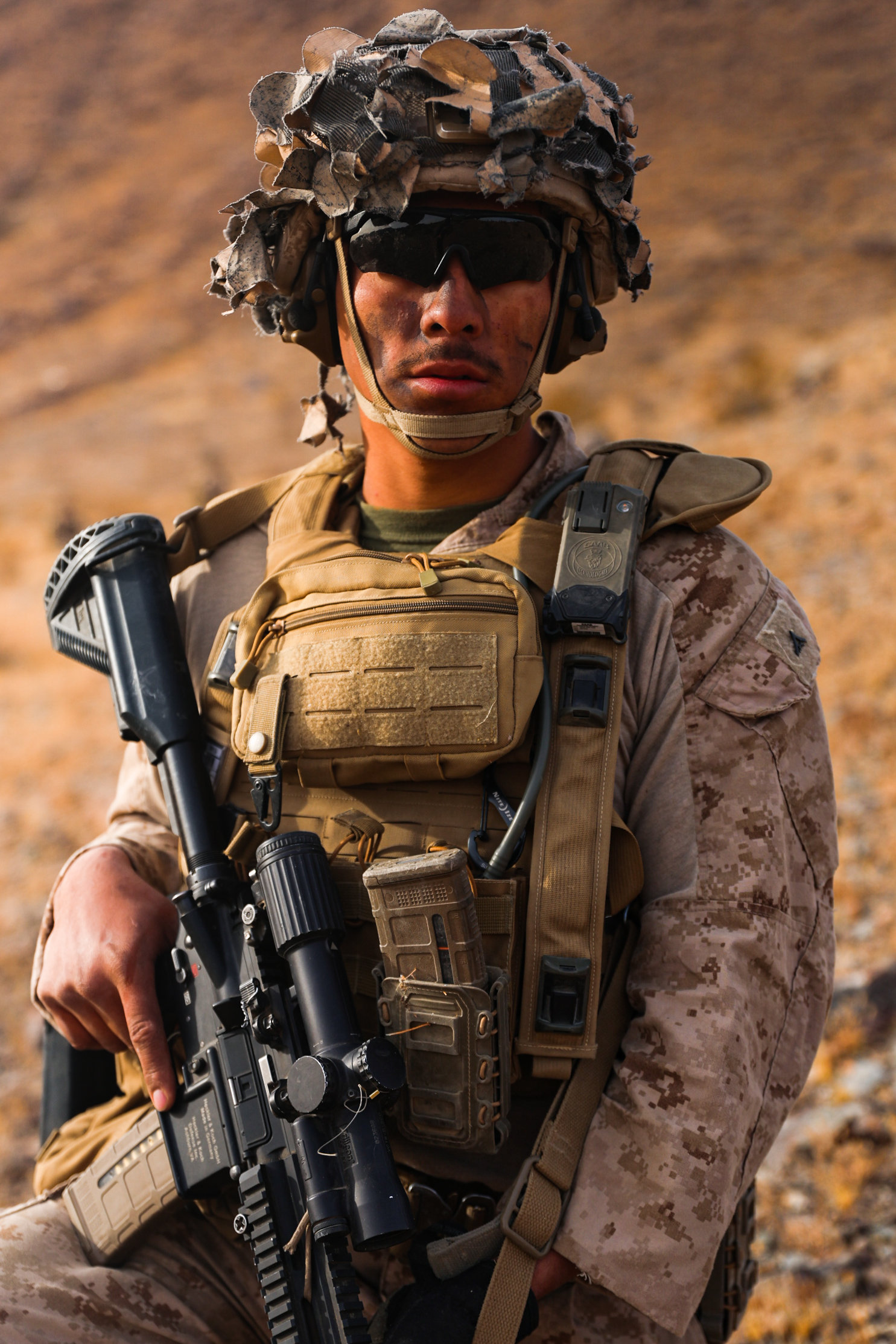 U.S. Marine Corps Lance Cpl. Emanuel Moralesangel surveys the area during an adversary force exercise at Marine Corps Air-Ground Combat Center, Twentynine Palms, California, Dec. 11, 2024. Moralesangel is a rifleman from Springfield, Tennessee. The AFX is the primary readiness-building event prior to Fox Company, 2nd Battalion, 23rd Marine Regiment’s upcoming deployment to Okinawa, Japan, in support of the Marine Corps’ Unit Deployment Program. The exercise serves as an opportunity to receive training across all warfighting functions in a realistic and fully resourced environment. (U.S. Marine Corps photo by Lance Cpl. Orion Stpierre)