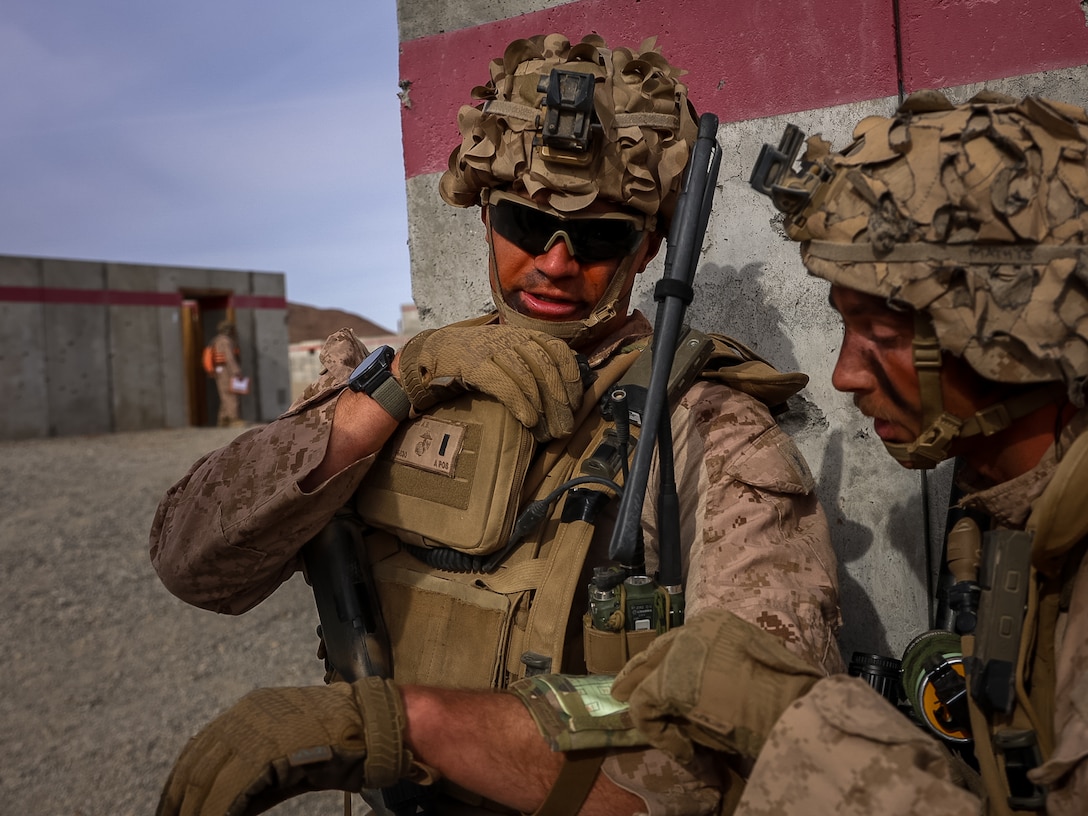 U.S. Marines with Fox Company, 2nd Battalion, 23rd Marine Regiment, conduct a company supported urban attack during training for upcoming deployment