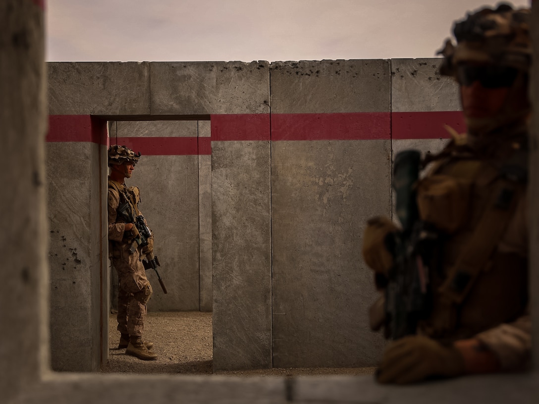 U.S. Marines with Fox Company, 2nd Battalion, 23rd Marine Regiment, conduct a company supported urban attack during training for upcoming deployment