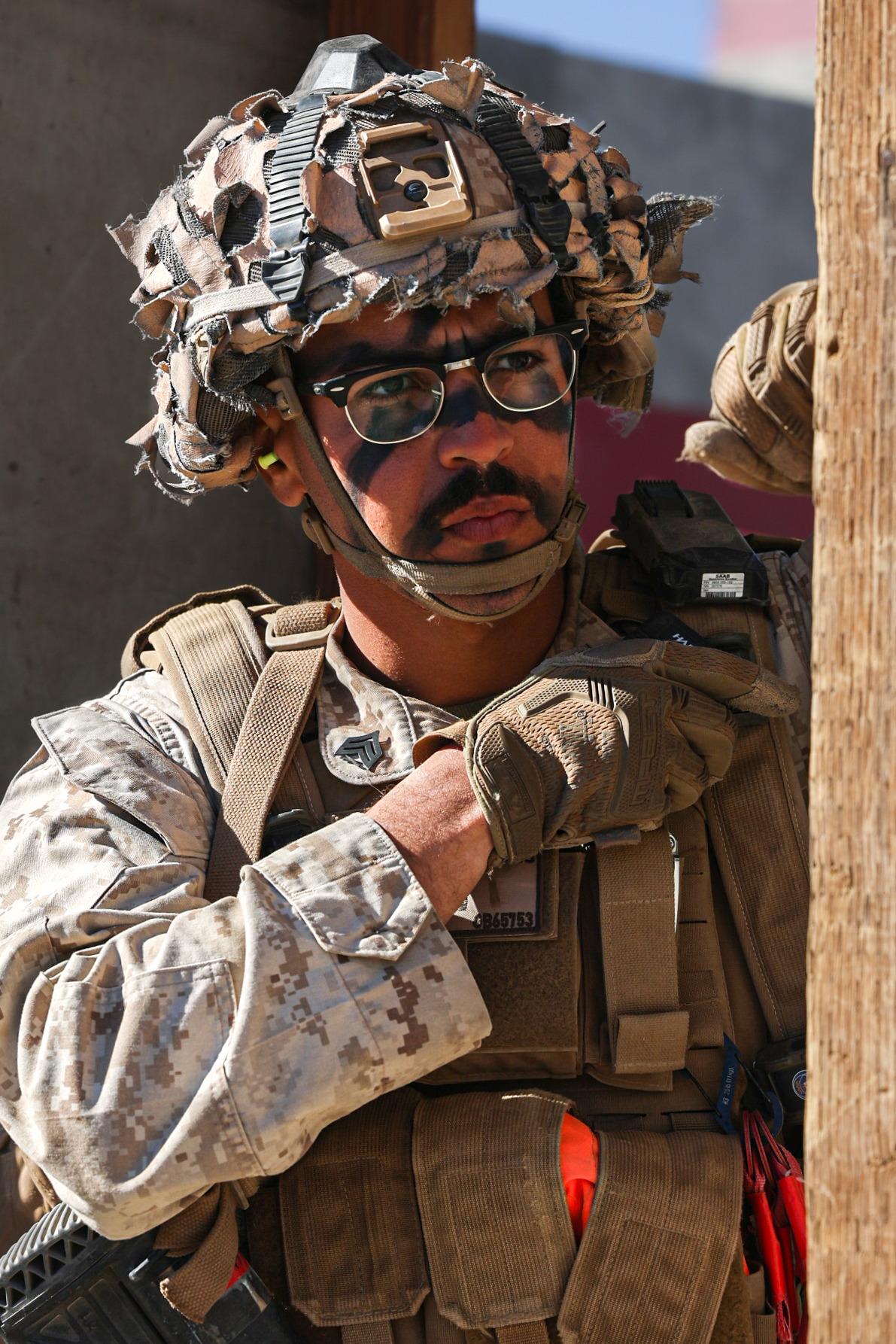 U.S. Marine Corps Sgt. Adam M. Bagul prepares to move his squad while clearing buildings during an adversary force exercise at Marine Corps Air-Ground Combat Center, Twentynine Palms, California, Dec. 10, 2024. Bagul is a squad leader from Trabuco Canyon, California. The AFX is the primary readiness-building event prior to Golf Company, 2nd Battalion, 23rd Marine Regiment’s upcoming deployment to Okinawa, Japan, in support of the Marine Corps’ Unit Deployment Program. The exercise serves as an opportunity to receive training across all warfighting functions in a realistic and fully resourced environment. (U.S. Marine Corps photo by Lance Cpl. Orion Stpierre)