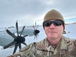 Col. Christopher Lantagne, Oregon Air National Guard director of staff, in front of a 109th Airlift Wing LC-130 in November 2024 in Antarctica. Lantagne recently finished a six-week tour as the commander of the 13th Air Expeditionary Group at McMurdo Station, Antarctica.