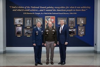 Army Lt. Gen. Jonathan Stubbs, director of the Army National Guard, hosts a ceremony to dedicate a display in honor of retired Army Lt. Gen. Herbert R. Temple Jr, the 21st chief of the National Guard Bureau, and namesake of the Army National Guard headquarters, Arlington, Virginia, Dec. 19, 2024. Air Force Gen. Steve Nordhaus left, and Army Gen. Daniel Hokanson, right, the 30th and 29th chiefs of the National Guard, respectively, spoke during the ceremony.