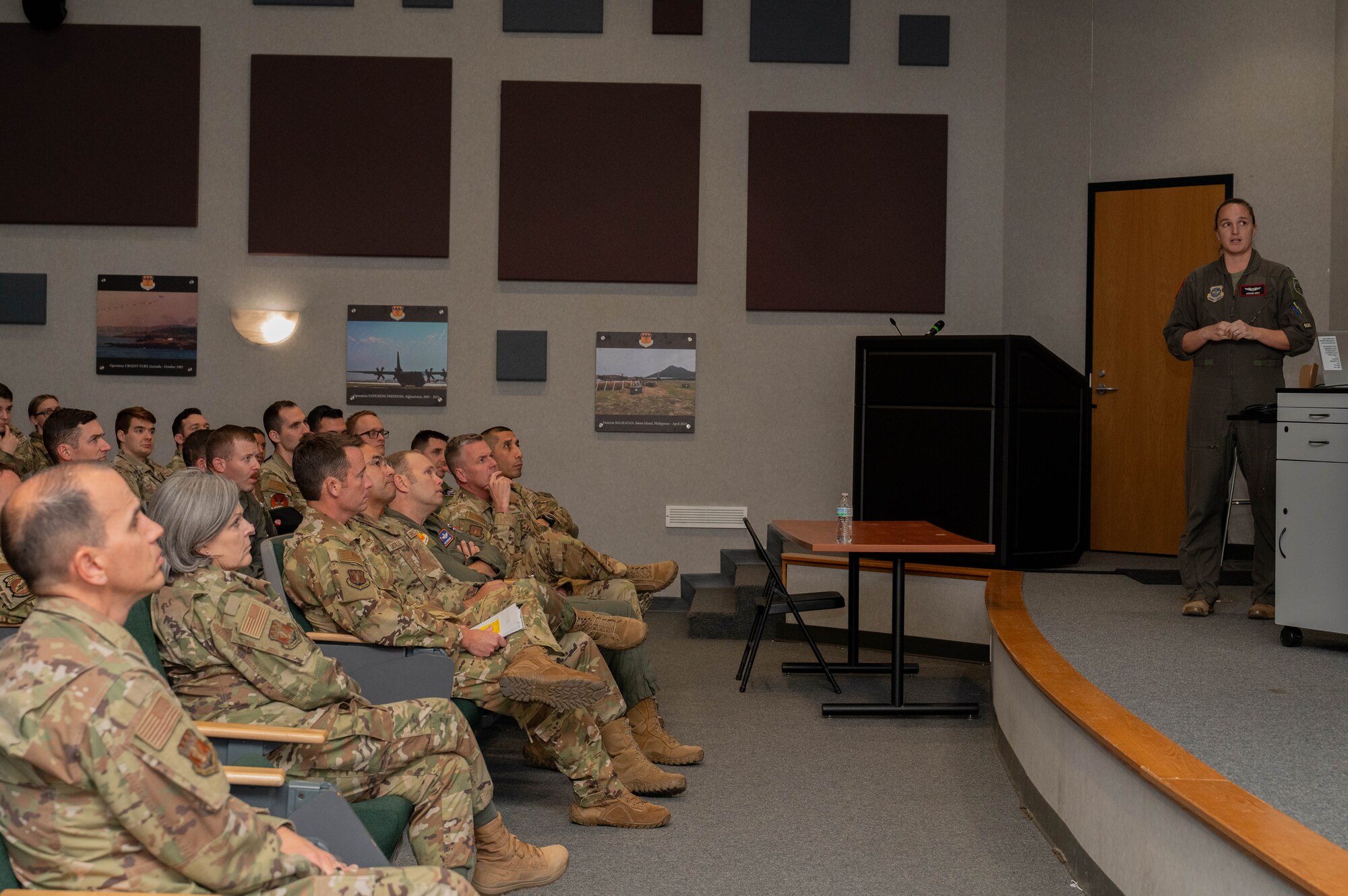U.S. Air Force Capt. Allyson Swift, 317th Airlift Wing Chief of Tactics, briefs during Hazard Hour at Dyess Air Force Base, Texas, Dec. 6, 2024. Joint Leadership Development is structured to delve into classified aspects of Joint Force mission sets and prepare 317th Airmen for rapid integration into a Joint contingency. (U.S. Air Force photo by Senior Airman Alondra Cristobal Hernandez)