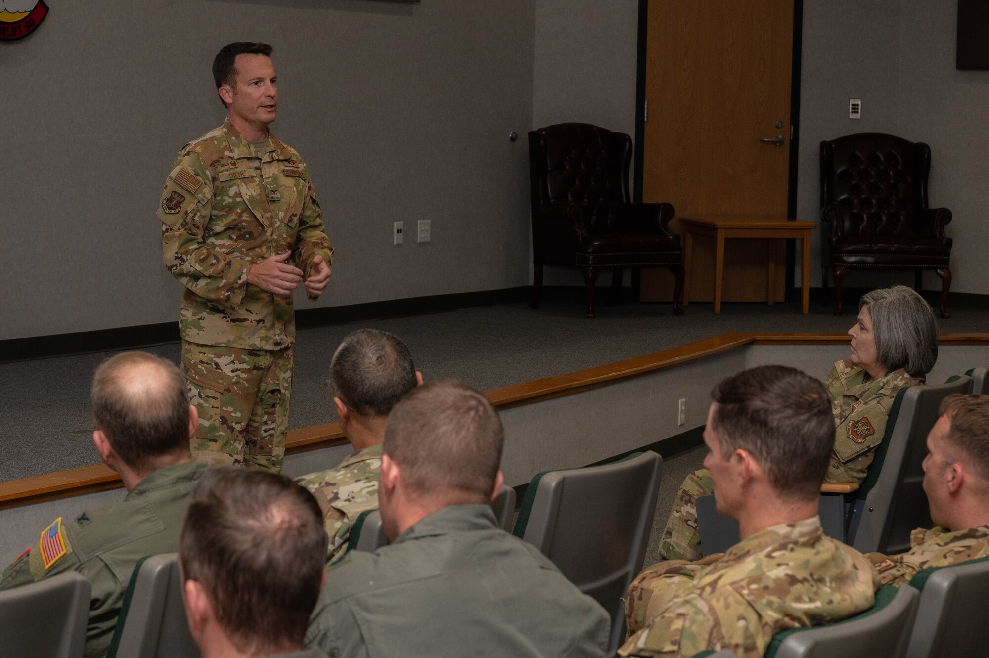 U.S. Air Force Col. Justin Diehl, 317th Airlift Wing commander, speaks with Airmen during Hazard Hour at Dyess Air Force Base, Texas, Dec. 6, 2024. The Joint Leadership Development Program was created to ensure 317th Airmen are ready to immediately integrate with the Joint Force during a rapid deployment. (U.S. Air Force photo by Senior Airman Alondra Cristobal Hernandez)