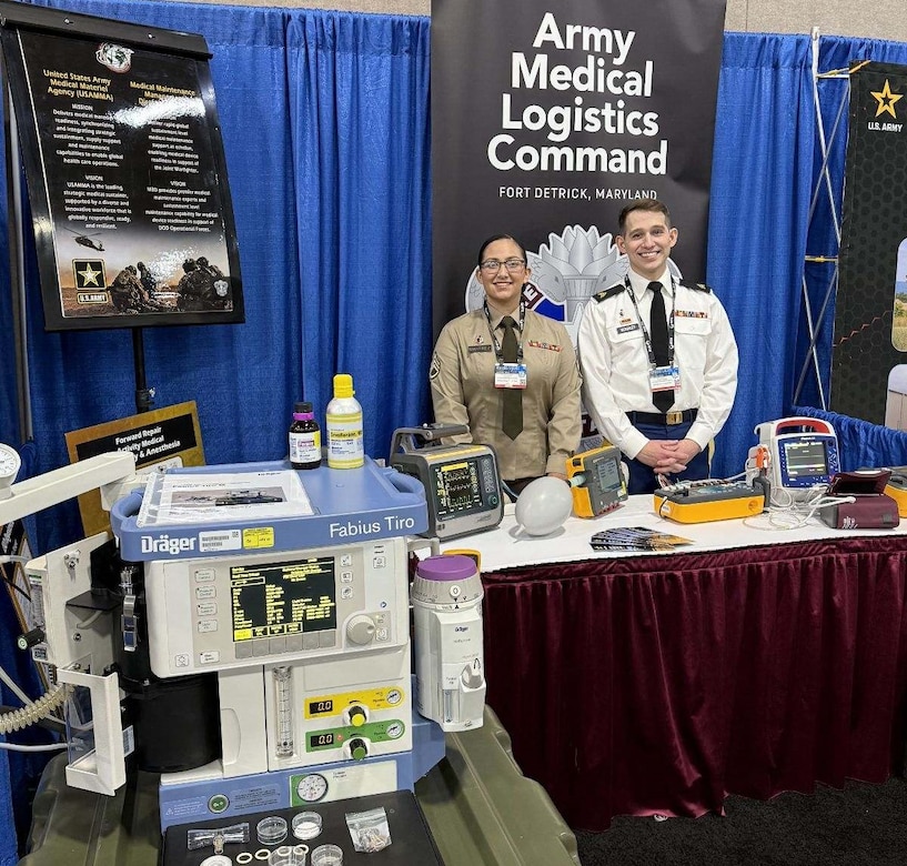 Staff Sgt. Nora Martinez, left, and Sgt. Nick McKinley from the U.S. Army Medical Materiel Agency’s Medical Maintenance Operations Division at Hill Air Force Base, Utah, are pictured at MMOD-UT’s booth during the 2024 DOD Maintenance Symposium, held Dec. 10-13 at the Salt Palace Convention Center in Salt Lake City. The event drew over 3,000 people.
