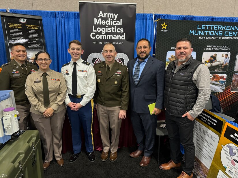 Leaders at the U.S. Army Medical Materiel Agency pose with Maj. Gen. Michael B. Lalor, center right, commanding general of U.S. Army Tank-Automotive and Armaments Command, during the 2024 DOD Maintenance Symposium, held Dec. 10-13 in Salt Lake City. Pictured with Lalor, from left, are USAMMA Commander Col. Joselito “Joe” Lim, Staff Sgt. Nora Martinez, Sgt. Nick McKinley, Jorge Magana, director of USAMMA’s Medical Maintenance Management Directorate, and Jose Vasquez, director of USAMMA’s Medical Maintenance Operations Division at nearby Hill Air Force Base, Utah. USAMMA is a direct reporting unit to Army Medical Logistics Command, where Lalor served as the organization’s first commander from 2019 to 2021.